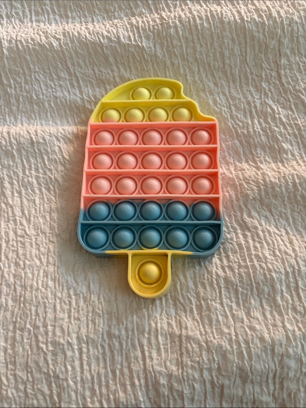 Popsicle-Shaped Silicone Pop-It Fidget Toy in Yellow, Pink & Blue